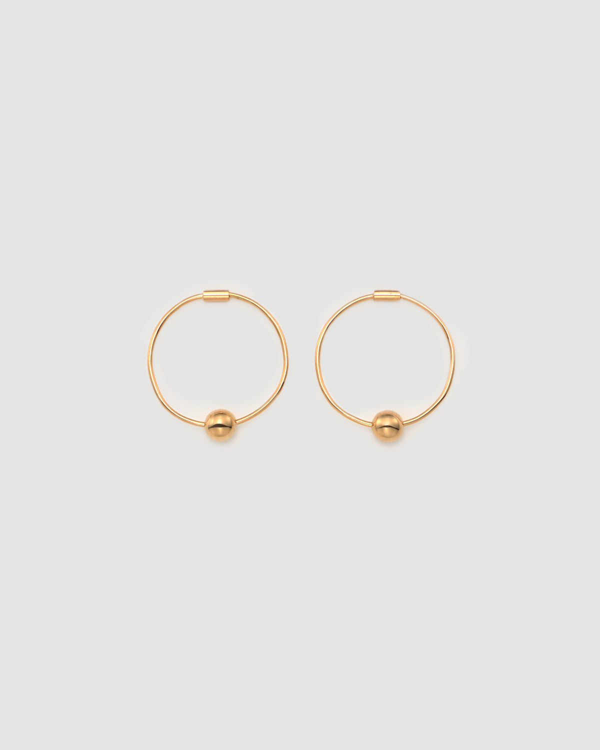 sphere hoop pierce