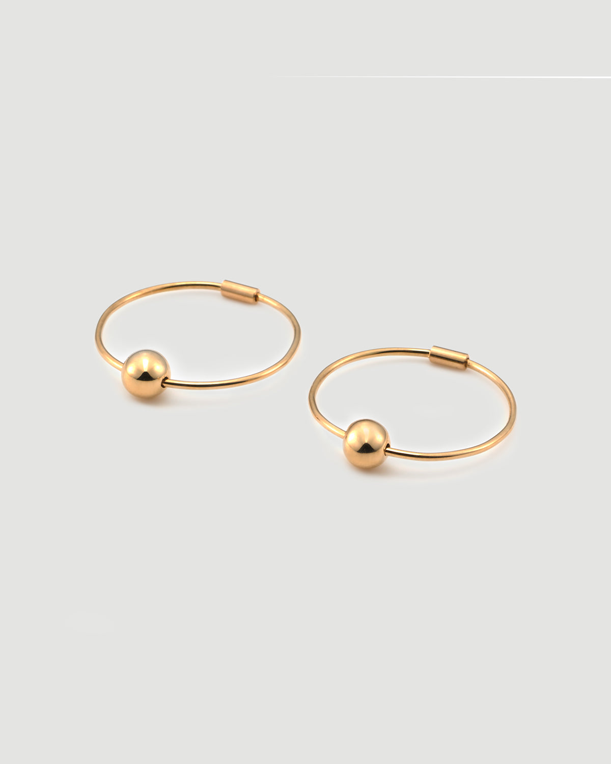 sphere hoop pierce
